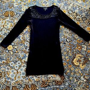 Black long sleeve knit dress with peek a boo lace on top